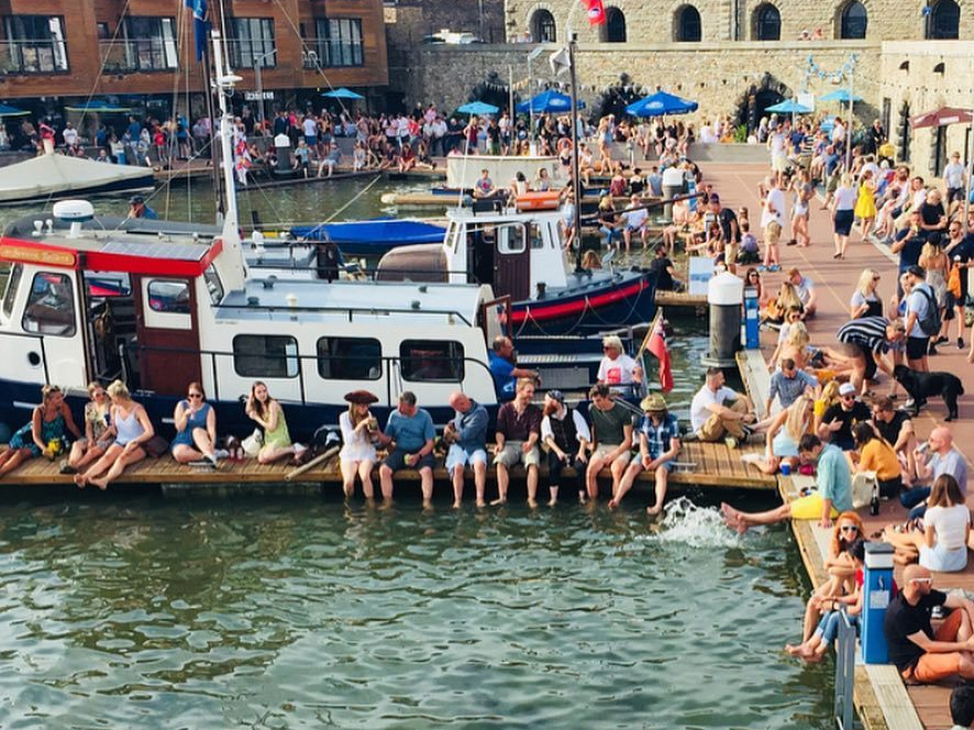 People sat on quays in Brunel Basin