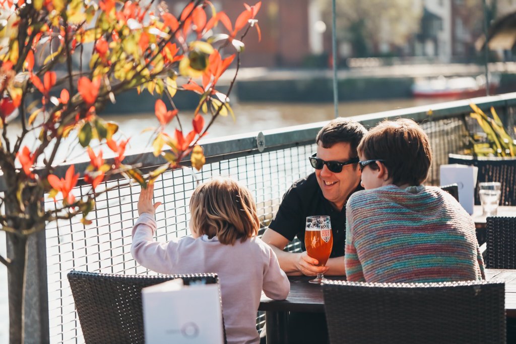 People sat on the terrace at Harbour House