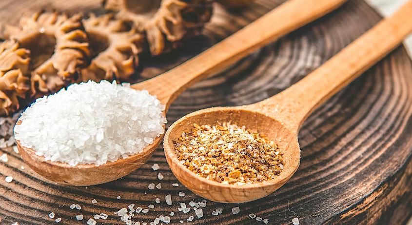 salt and chilli flakes on spoons