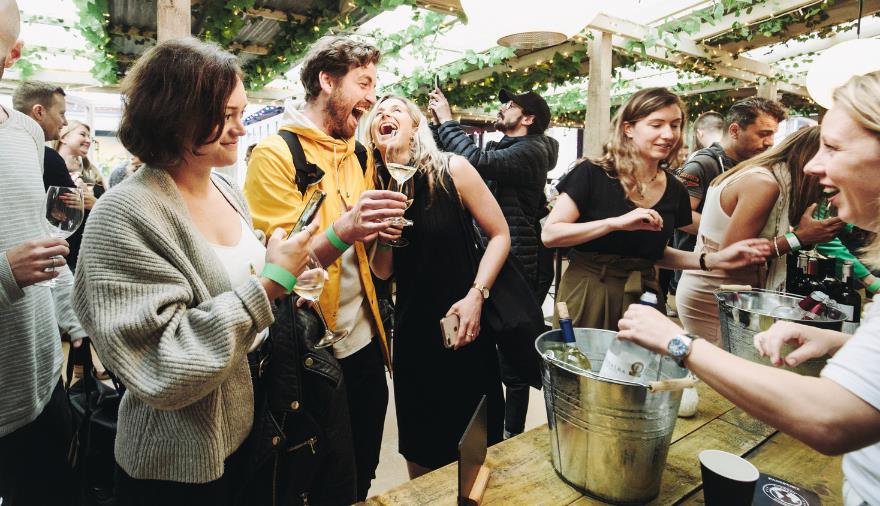 People at wine tasting event