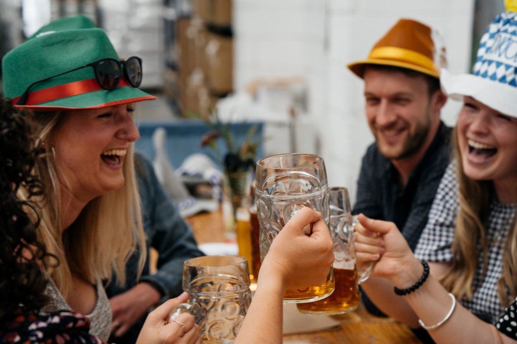 People with steins in German hats