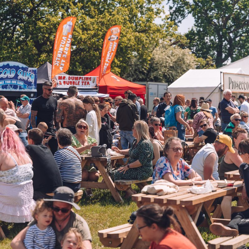 Crowd of people eating food at festival
