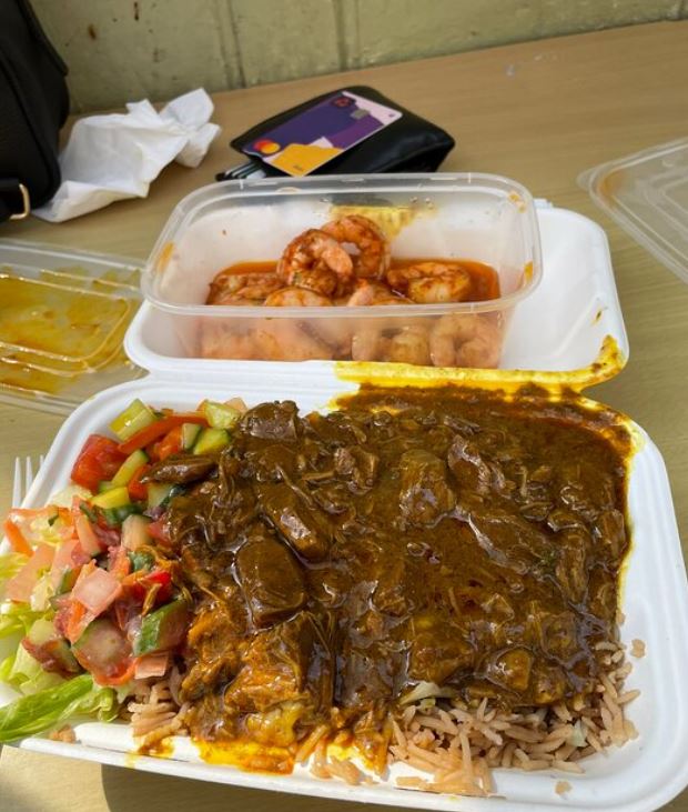 Caribbean curry on rice with salad