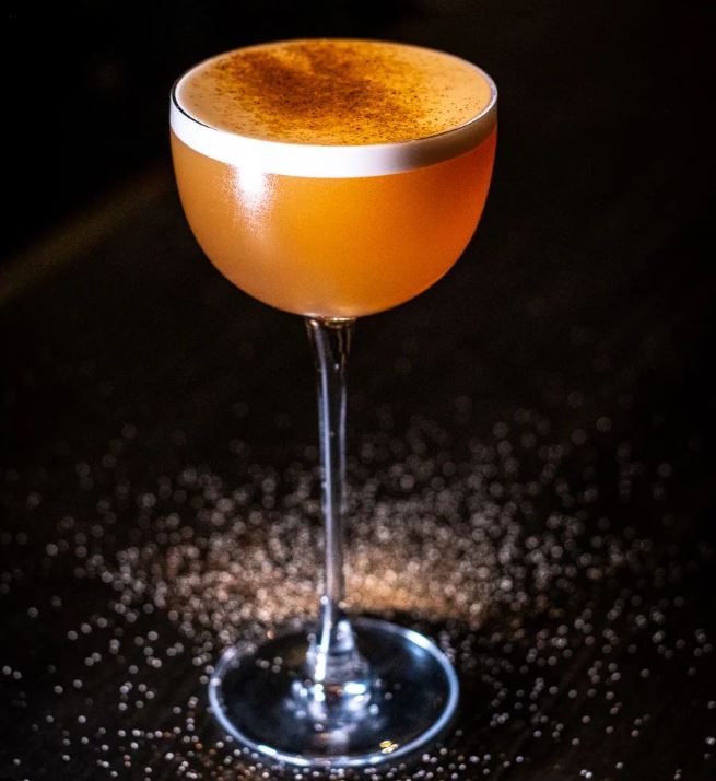 Orange cocktail with glitter