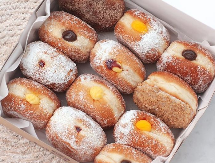Box of filled doughnuts