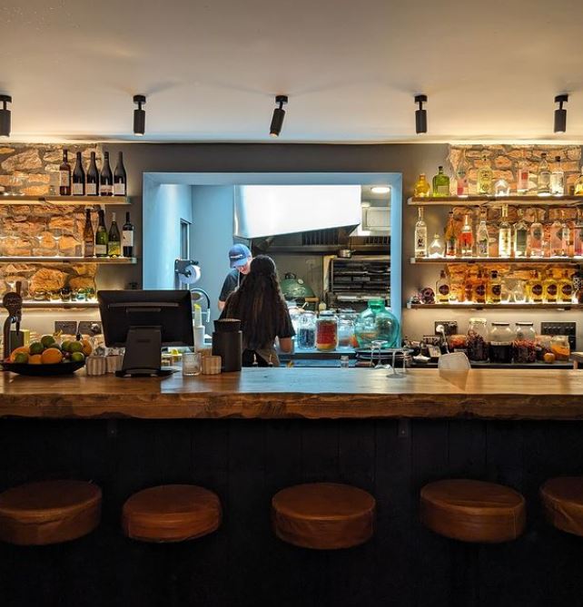 Bar and kitchen at Condesa
