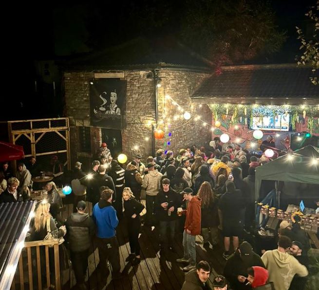 People in beer garden at The Sugar Loaf