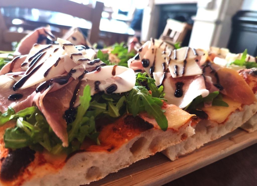 Open sandwich with parma ham and mozarella