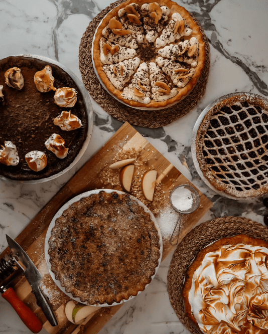 Selection of sweet pies on counter